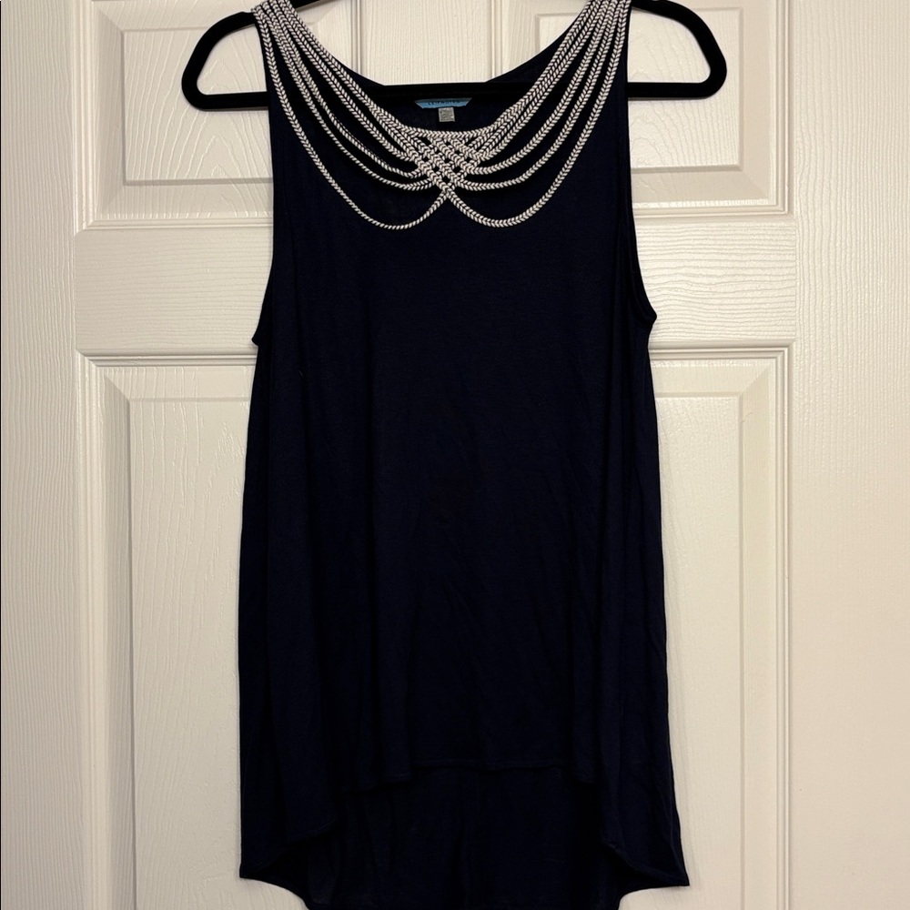 Black (or very dark navy) sleeveless high low top